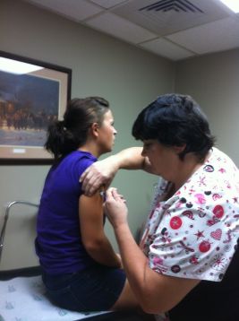 Tammie giving a shot.